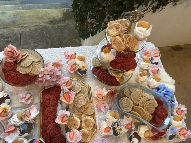 A dessert grazing board built out end to end around a number one
