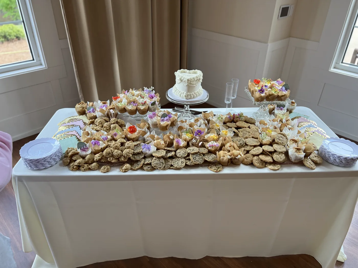 A long dessert table set end to end for an event