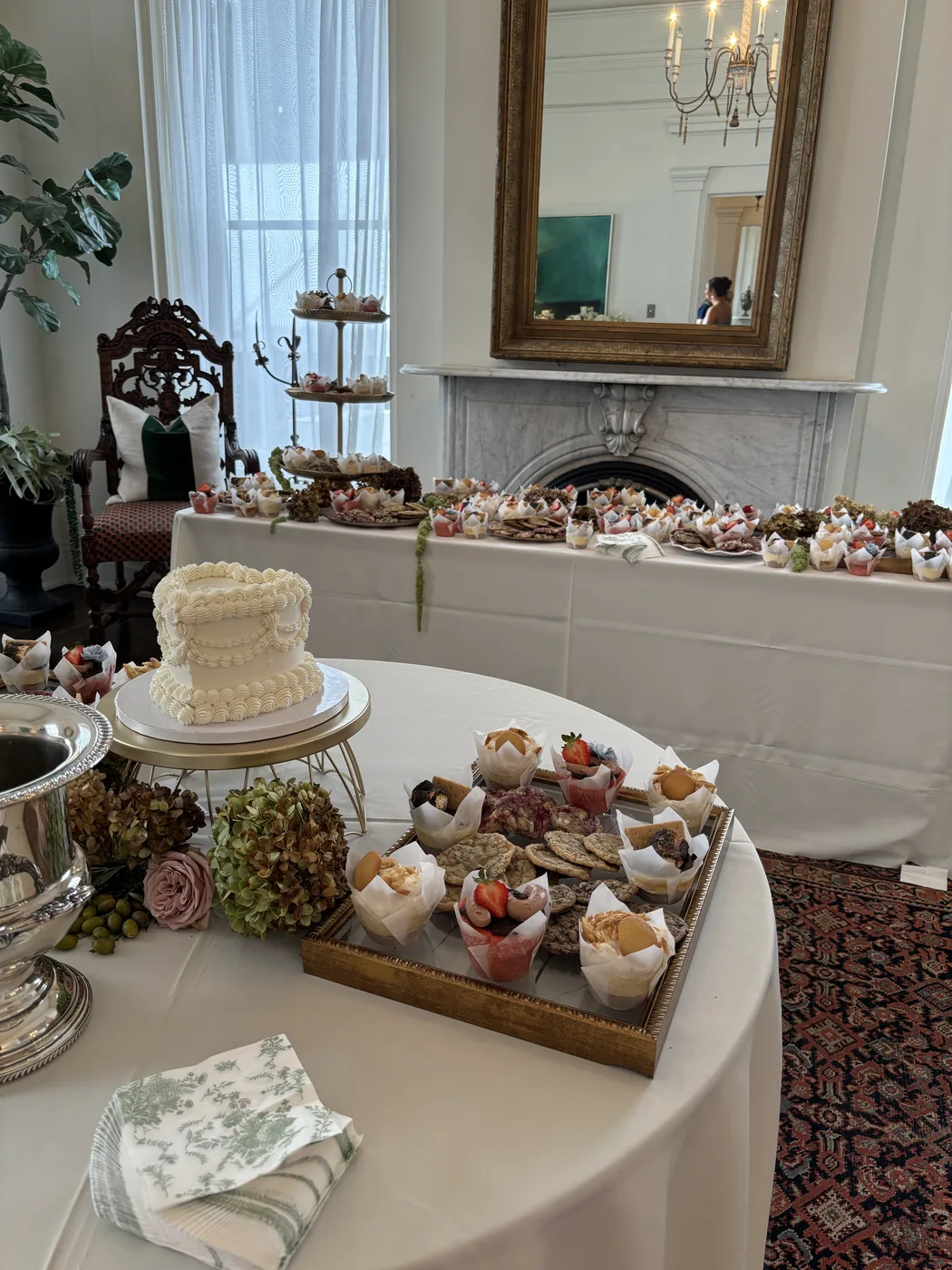 A dessert table laid out in the room before guests arrive